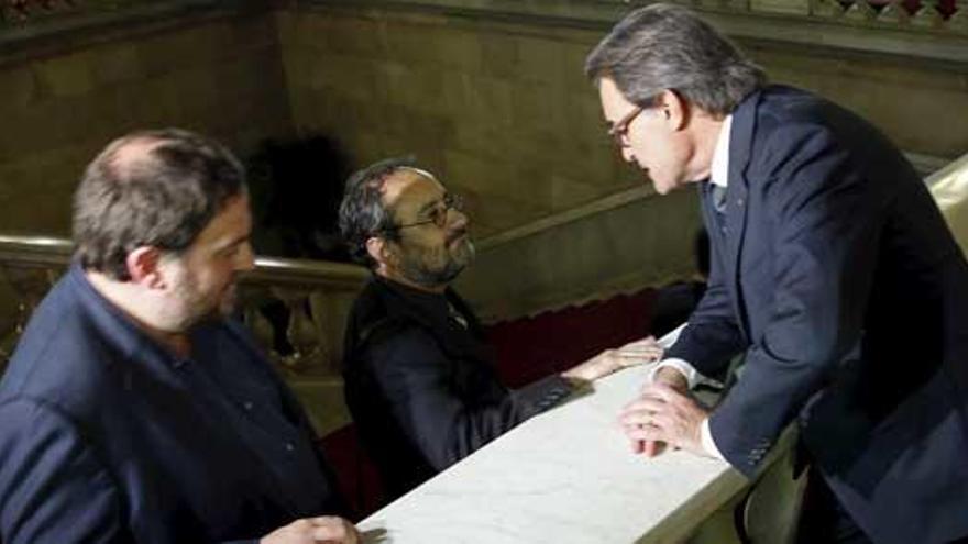 Junqueras, Baños y Mas, en el Parlament.