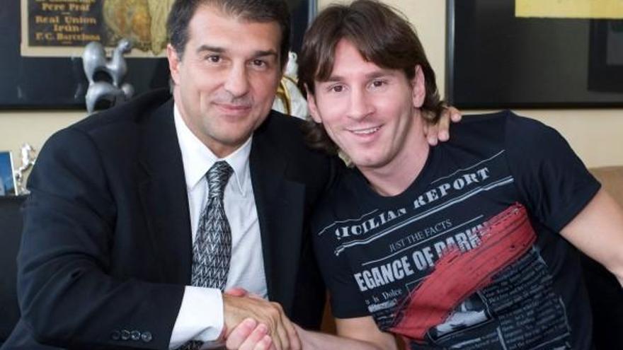 Joan Laporta y Lionel Messi.