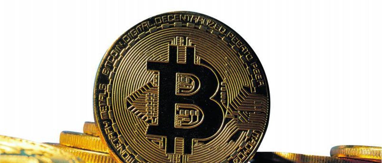 Representación física de un  bitcoin. | INFORMACIÓN