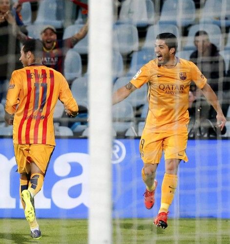 Barcelona's Suarez celebrates his goal against Getafe during their Spanish first division soccer match at Coliseum Alfonso Perez stadium in Getafe, near Madrid, Spain