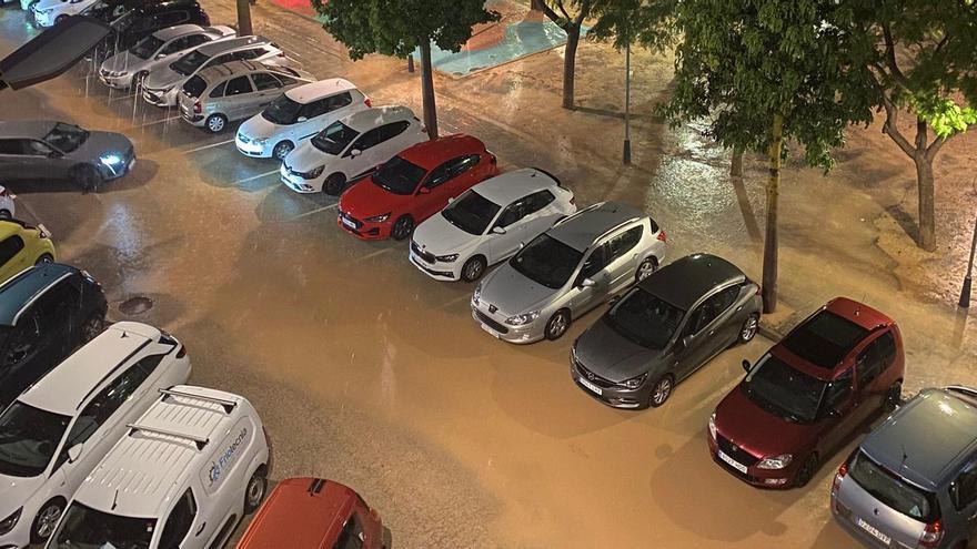La calle l'Horta de Benetússer, inundada
