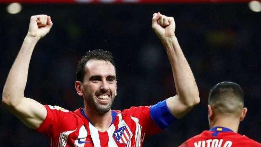 Godín celebra su gol, el de la victoria del Atlético.