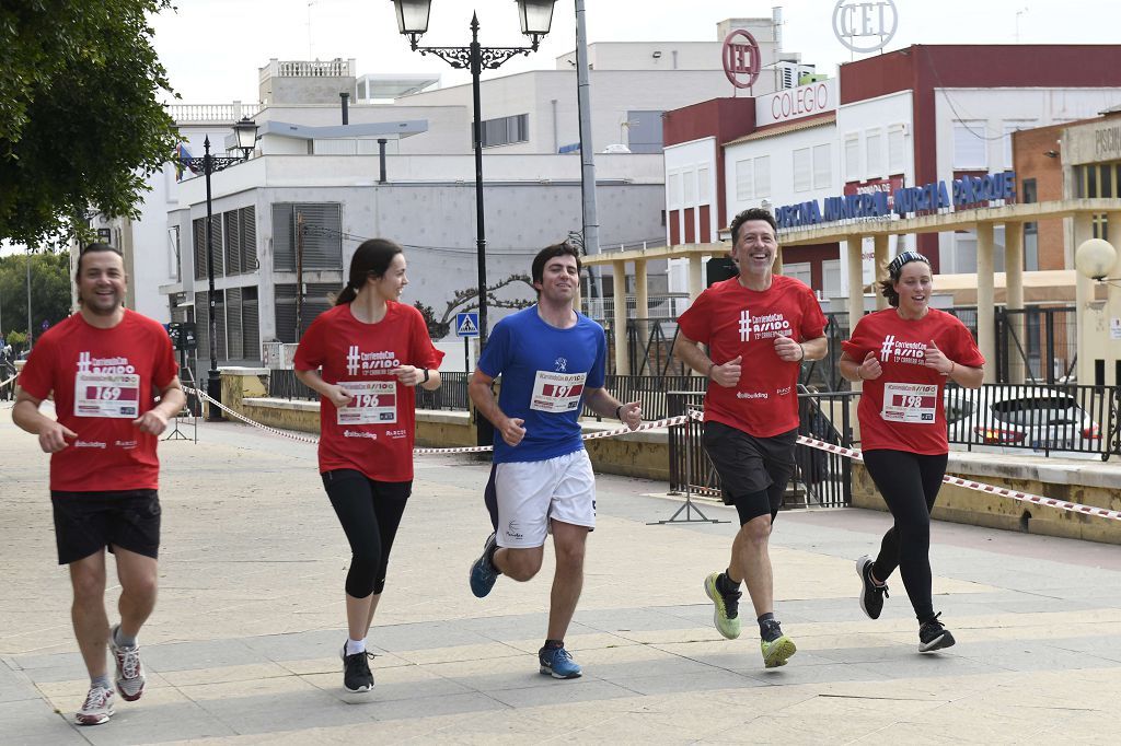 La XIII carrera solidaria Corriendo con Assido, en imágenes
