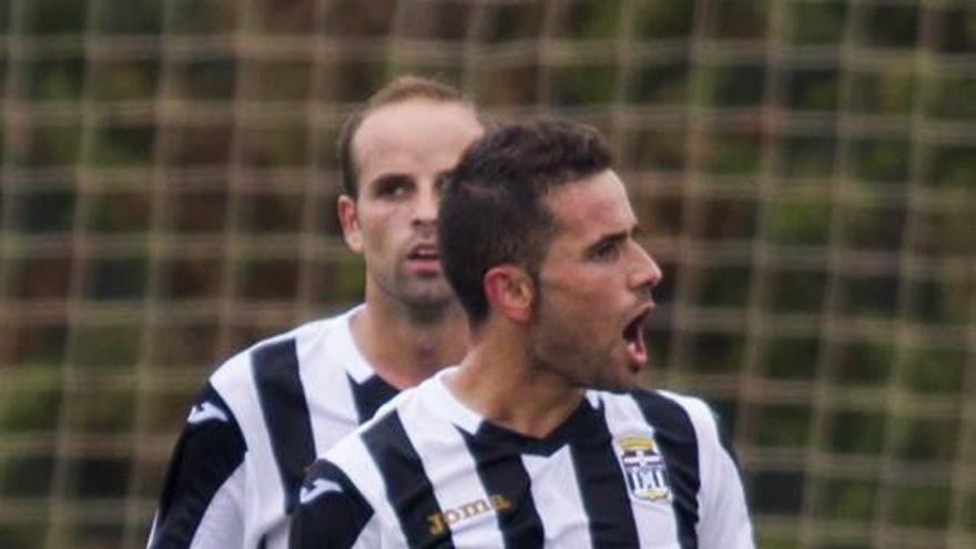 Juan Carlos Menudo y Sergio García, en un partido.