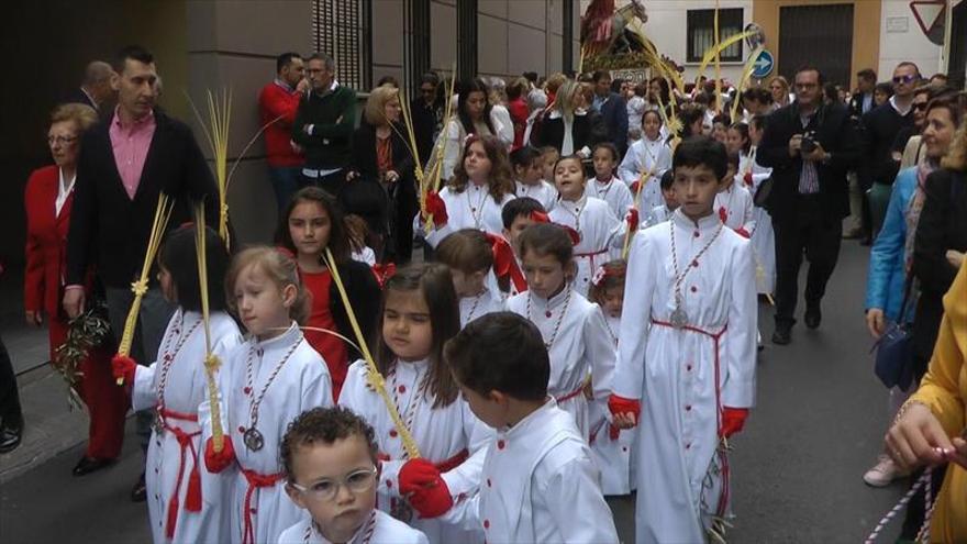 Los niños y el buen tiempo se unen a Jesús en la Borriquita