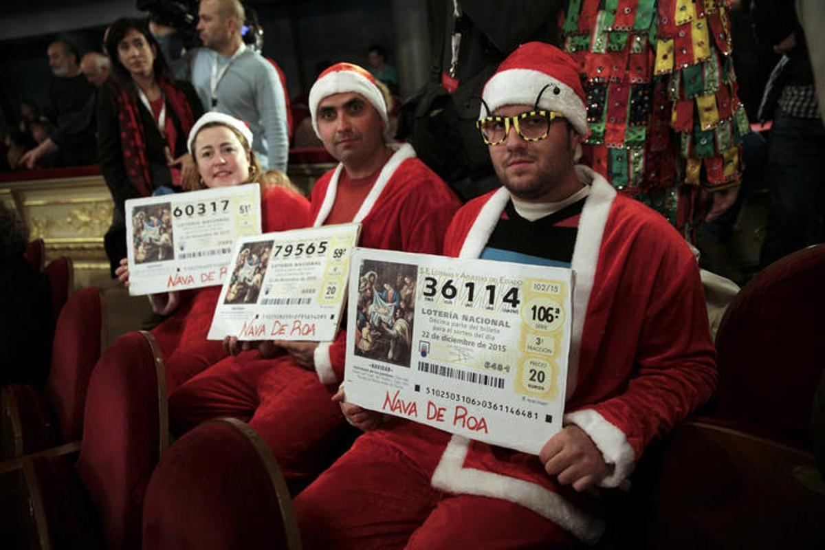People dressed in costumes attend the draw of Spain's Christmas Lottery "El Gordo" in Madrid People dressed in costumes attend the draw of Spain's Christmas Lottery "El Gordo" in Madrid