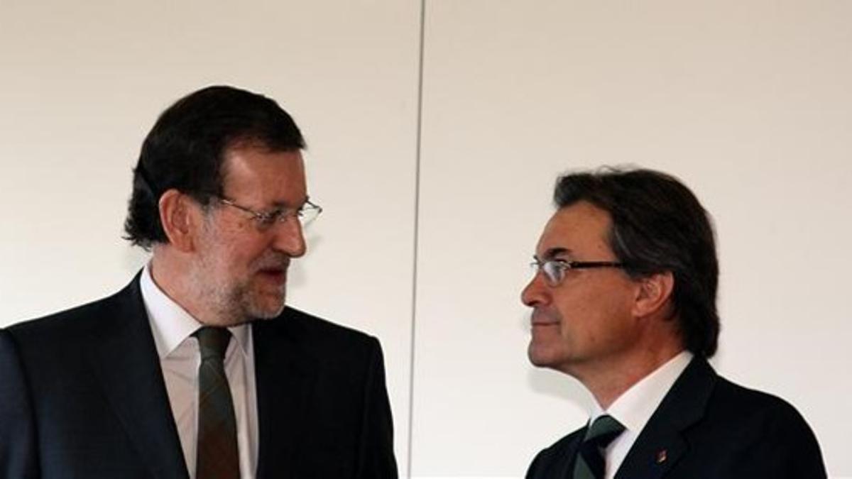 Mariano Rajoy y Artur Mas, el pasado 8 de enero, durante la inauguración de la nueva línea de AVE entre Barcelona y Figueres.