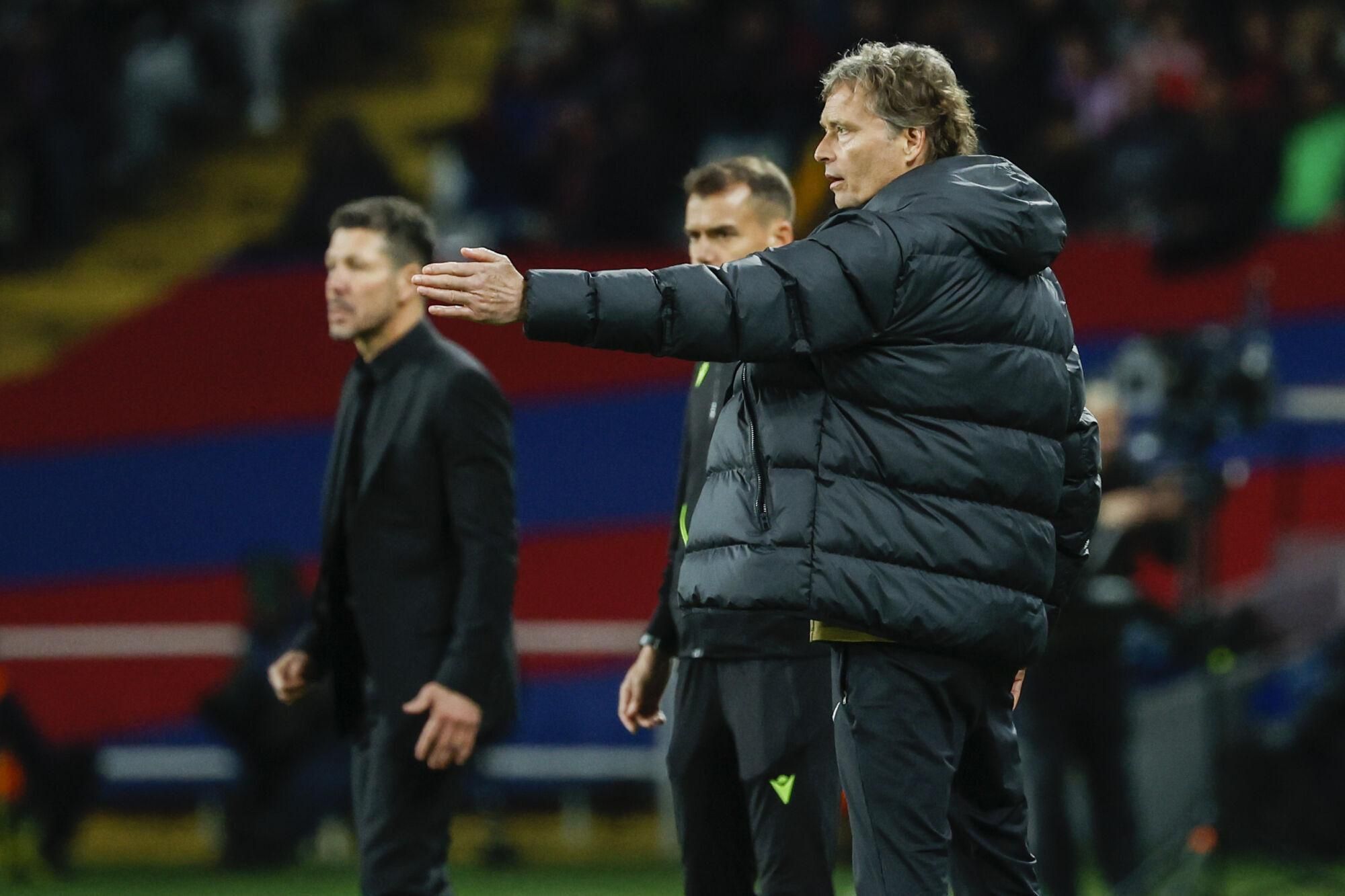 Barcelona's assistant coach Marcus Sorg gestures during the Spanish La Liga soccer match between Barcelona and Atletico Madrid at the Lluis Companys Olympic Stadium in Barcelona, Spain, Saturday, Dec. 21, 2024. (AP Photo/Joan Monfort). EDITORIAL USE ONLY/ONLY ITALY AND SPAIN