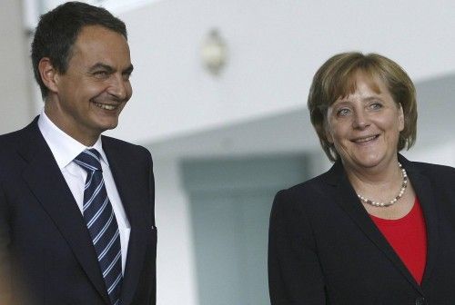 Zapatero y Merkel en una conferencia