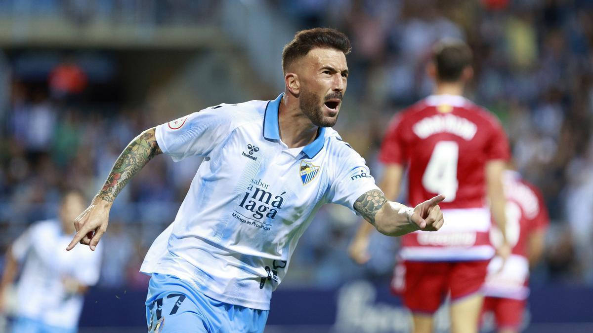 Dioni celebra un gol con la camiseta del Málaga CF