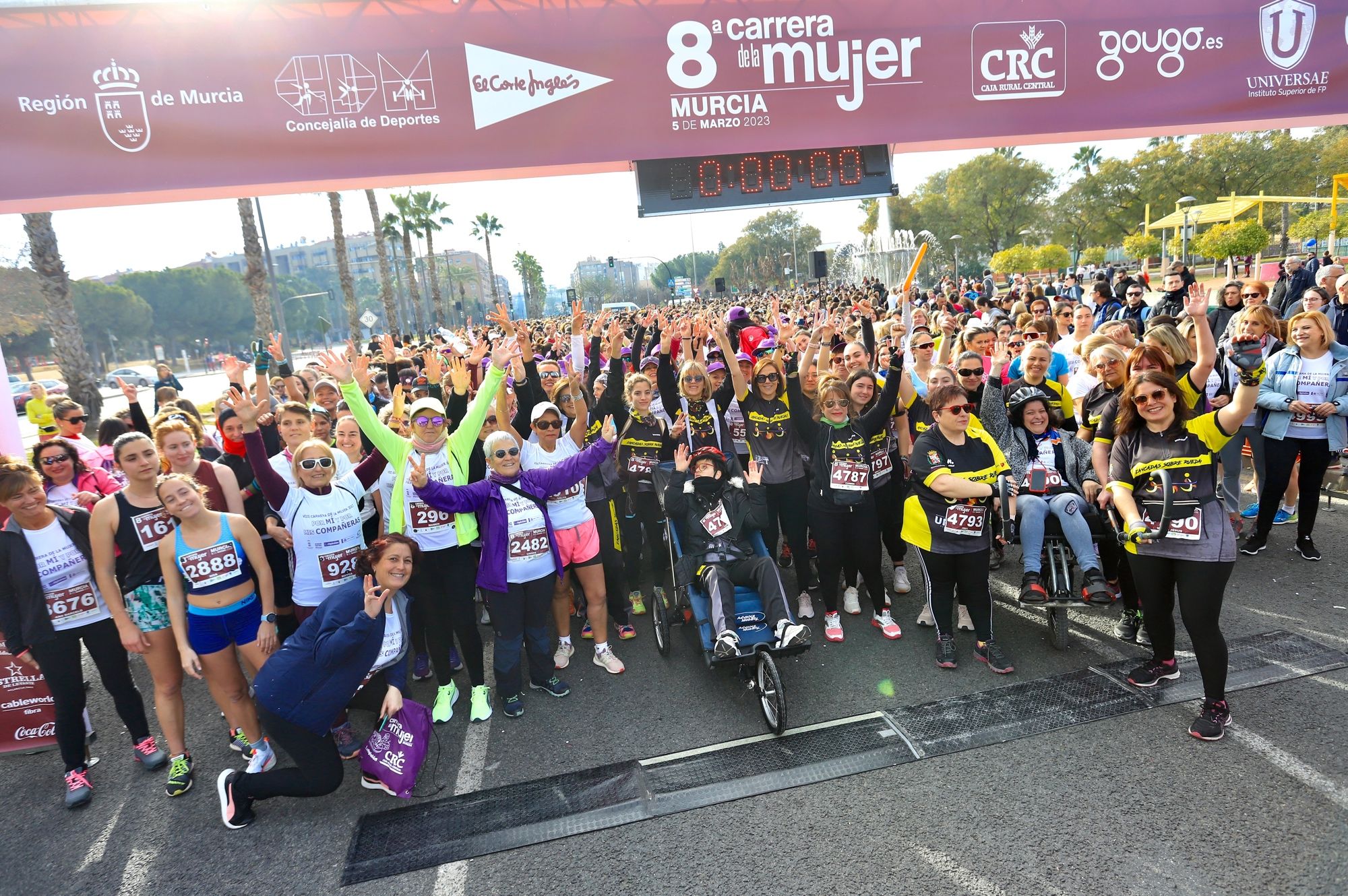 La salida y el recorrido de la Carrera de la Mujer 'inmortalizados' en imágenes