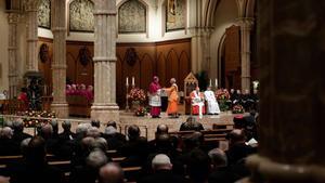 Archbishop of Chicago  Blase Cupich  L  greets a clergyman at Holy Name Cathedral during the Liturgy of the Word with Rite of Reception in Chicago  Illinois    Photo by Joshua LOTT   GETTY IMAGES NORTH AMERICA   AFP 