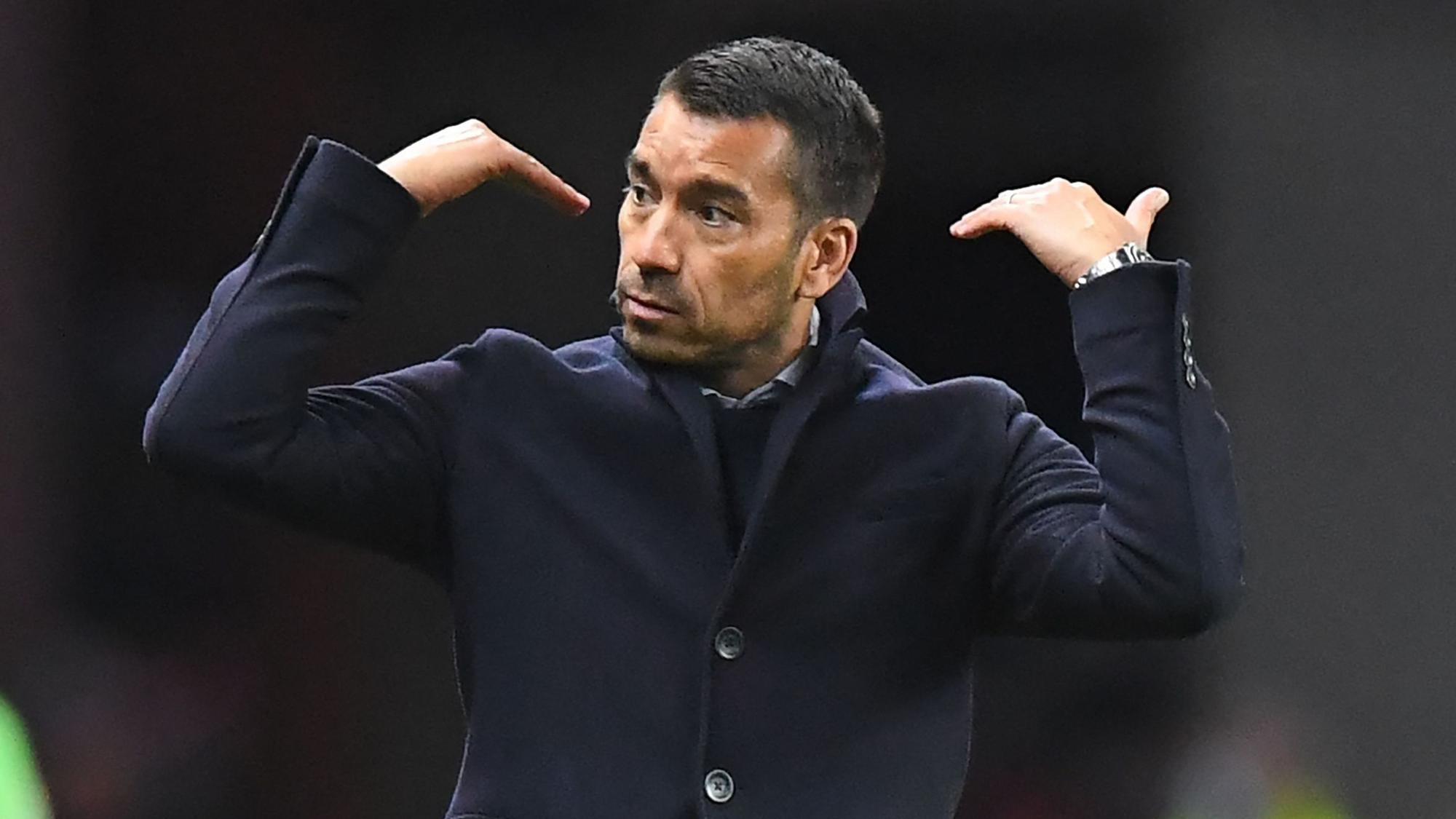 Rangers' Dutch manager Giovanni van Bronckhorst gestures on the touchline during the UEFA Europa League Quarter-final, second leg football match between Rangers and Sporting Braga at the Ibrox Stadium, in Glasgow, on April 14, 2022. (Photo by ANDY BUCHANAN / AFP)