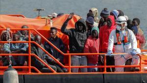 zentauroepp52921074 migrants wait to disembark from a spanish coast guard vessel200326142330