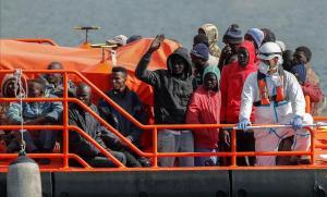 zentauroepp52921074 migrants wait to disembark from a spanish coast guard vessel200326142330