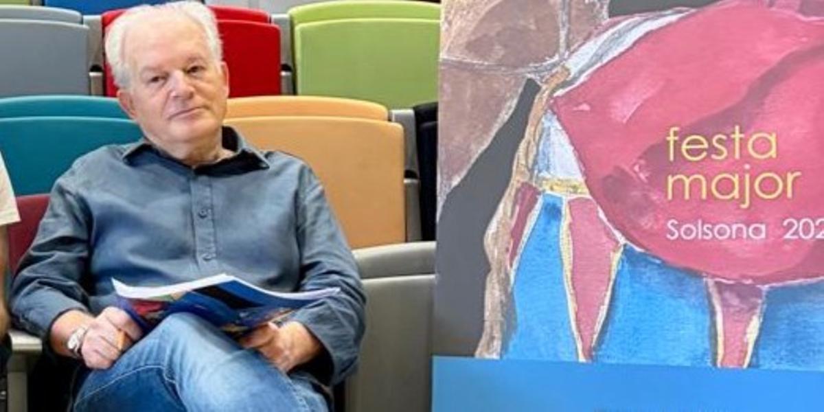 El pintor amb el cartell de la Festa Major