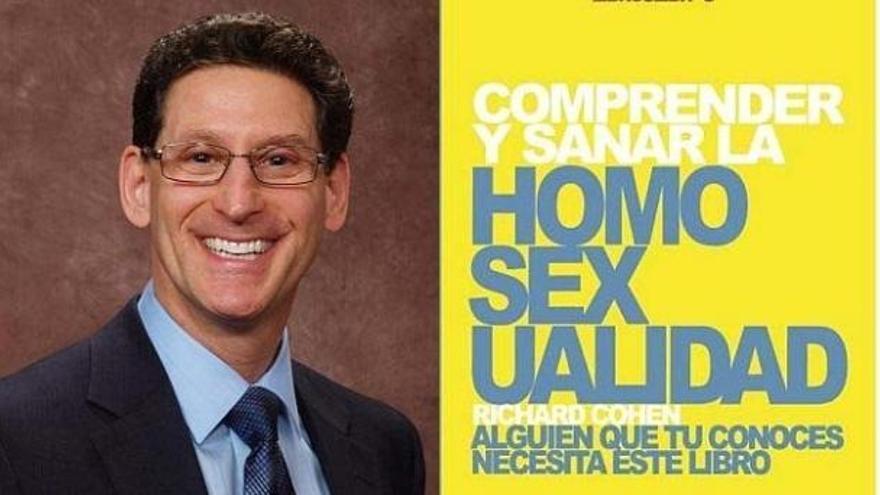 El autor del libro junto a la portada del mismo