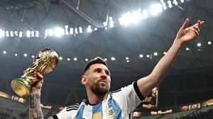 (FILES) Argentinas captain and forward #10 Lionel Messi, his wife Antonela Roccuzzo and sons Thiago (C) and Ciro pose with the FIFA World Cup Trophy after Argentina won the Qatar 2022 World Cup final football match between Argentina and France at Lusail Stadium in Lusail, north of Doha on December 18, 2022. Morocco, Portugal and Spain will be joint hosts for the 2030 World Cup but games will also be played in Uruguay, Argentina and Paraguay, FIFA announced on October 4, 2023. Once the technical criteria have been validated, the governing body of world football will make official the award of its flagship event in 2024. FIFA said in a statement that the matches in South America were part of the celebration of the centenary of the first World Cup in Uruguay. The statement said a centenary ceremony will be held at the stadium where it all began, in Montevideos Estadio Centenario in 1930. (Photo by Anne-Christine POUJOULAT / AFP)