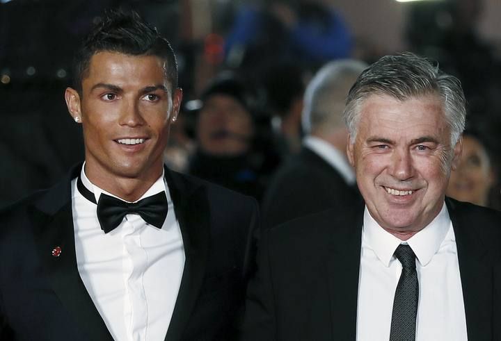 Ronaldo poses with Ancelotti for photographers on the red carpet at the world premiere of "Ronaldo" at Leicester Square in London