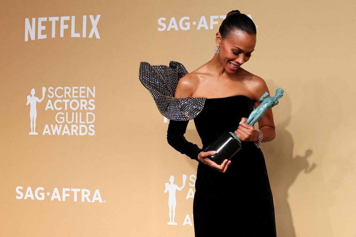 Zoe Saldana poses with the award for Best Performance by a Female Actor in a Supporting Role for "Emilia Perez" at the 31st Screen Actors Guild Awards, in Los Angeles, California, U.S., February 23, 2025. REUTERS/Daniel Cole