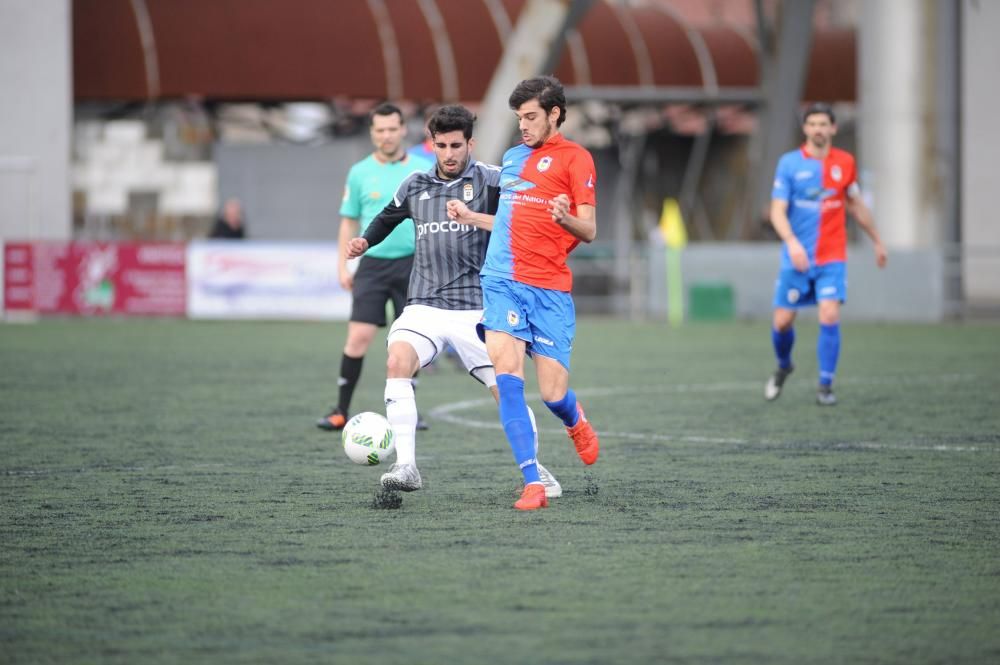 El partido entre el Langreo y el Oviedo B, en imágenes