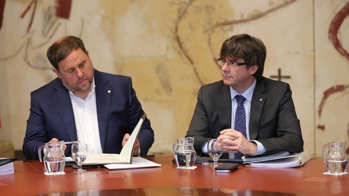 Oriol Junqueras y Carles Puigdemont