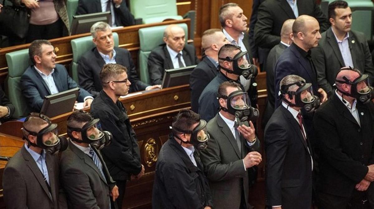 jjubierre32856319 kosovo police officers weeraing gas masks secure t160219125817