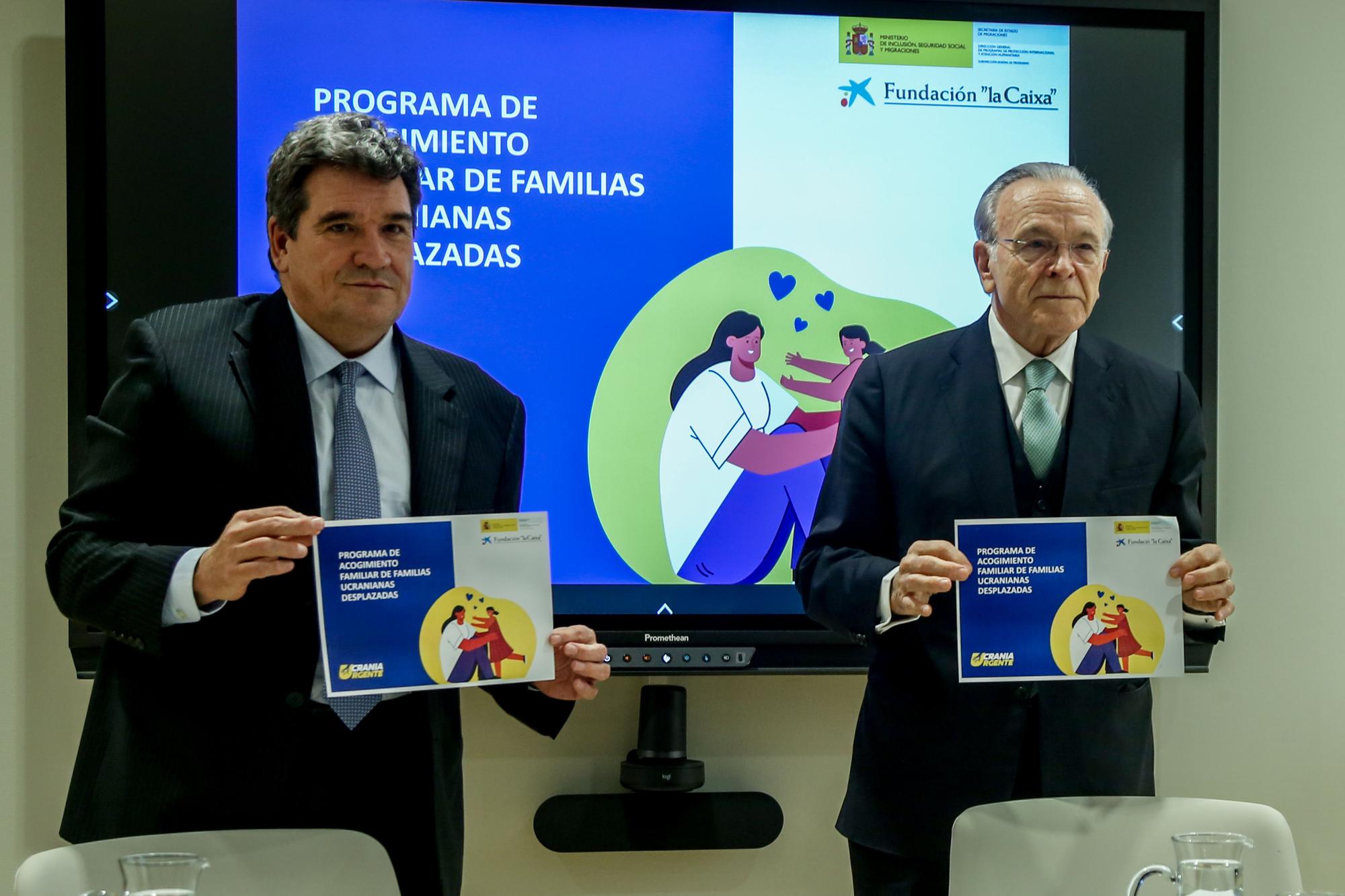 El ministro de Inclusión, Seguridad Social y Migraciones, José Luis Escrivá, y el presidente de Fundación La Caixa, Isidre Fainé.