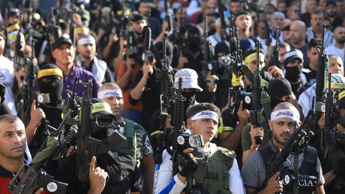 Fighters of Al-Aqsa Brigades hold a rally in Jenin refugee camp