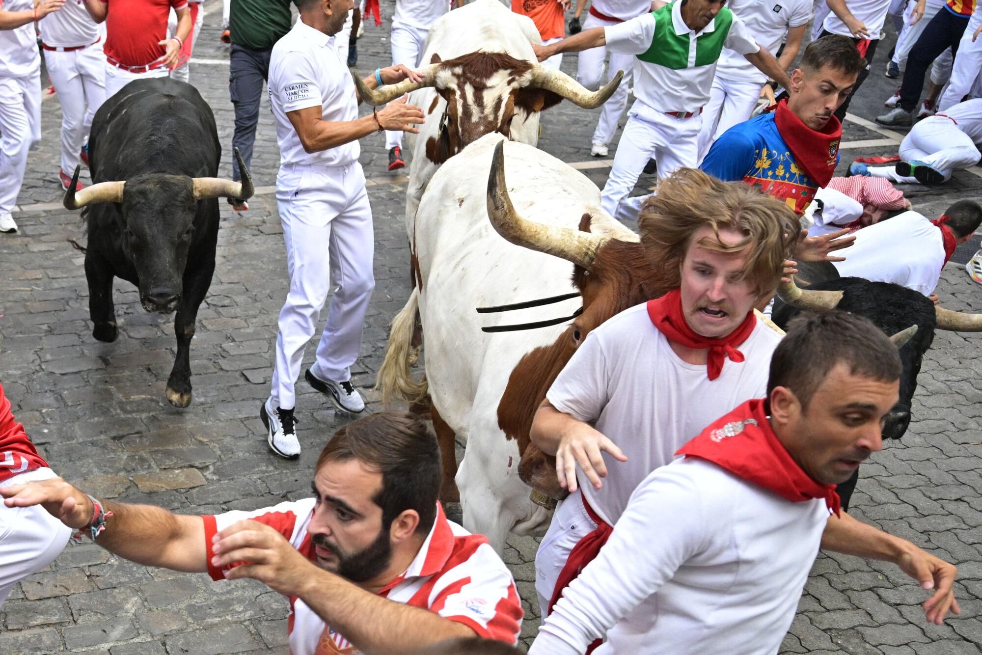 El primer encierro de los Sanfermines 2025, en imágenes.