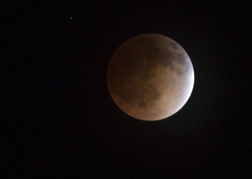 The moon is shown in eclipse from Salt Lake City