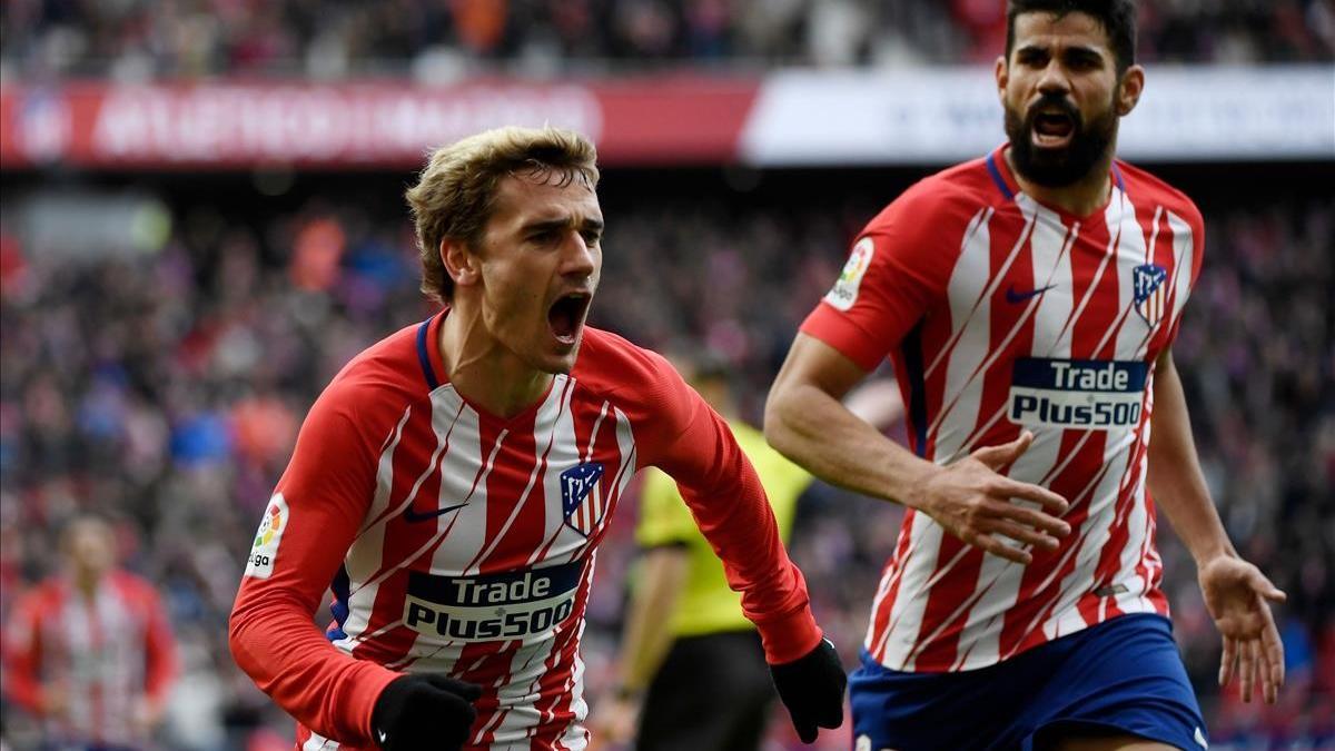 Griezmann y Diego celebran uno de los goles al Celta el 11 de marzo