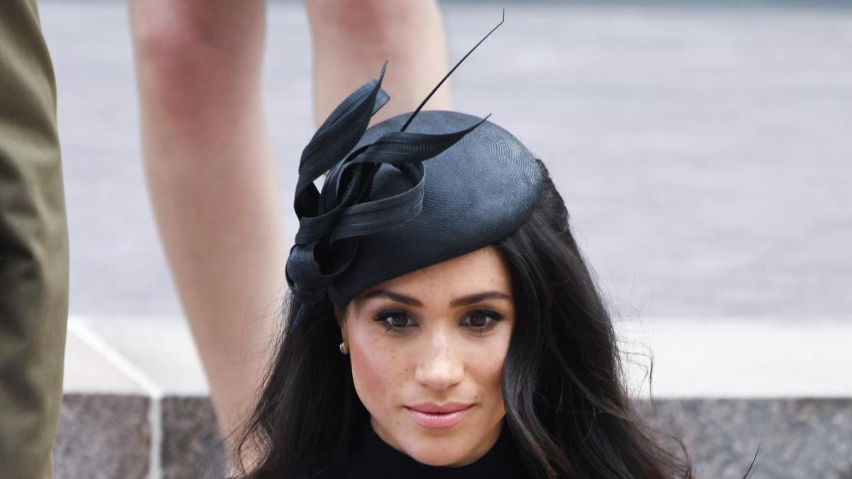 Meghan Marklw con look en negro en Sidney