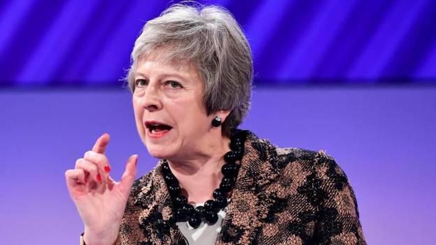 Theresa May va avançar que encara queden temes a negociar amb la UE.