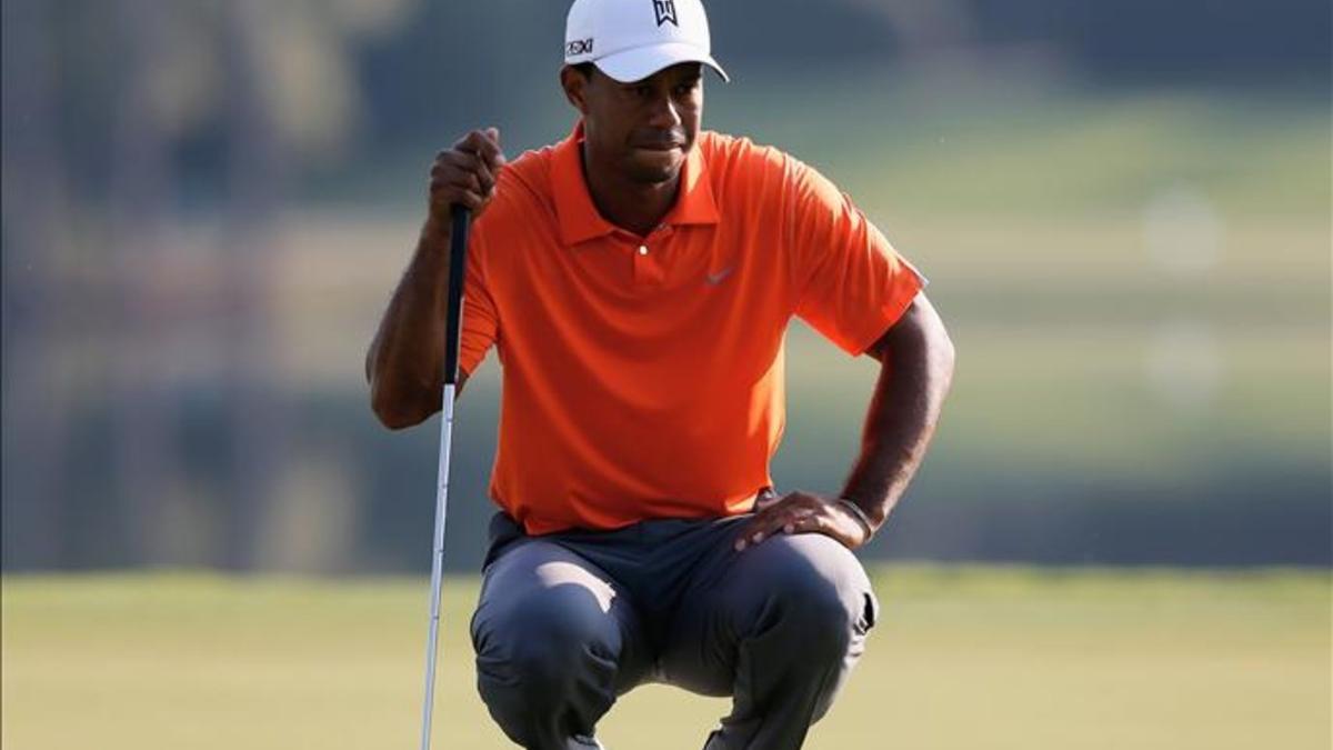 Tiger Woods celebra 20 de su primer triunfo