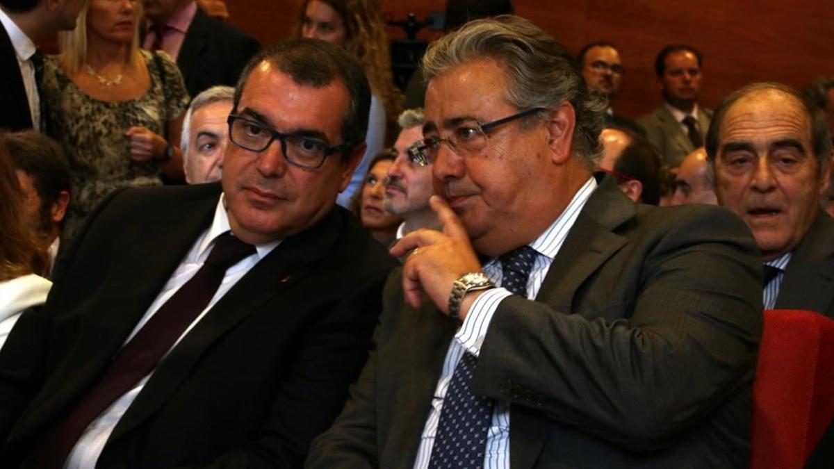 El 'conseller' Jordi Jané y el ministro Juan Ignacio Zoido.