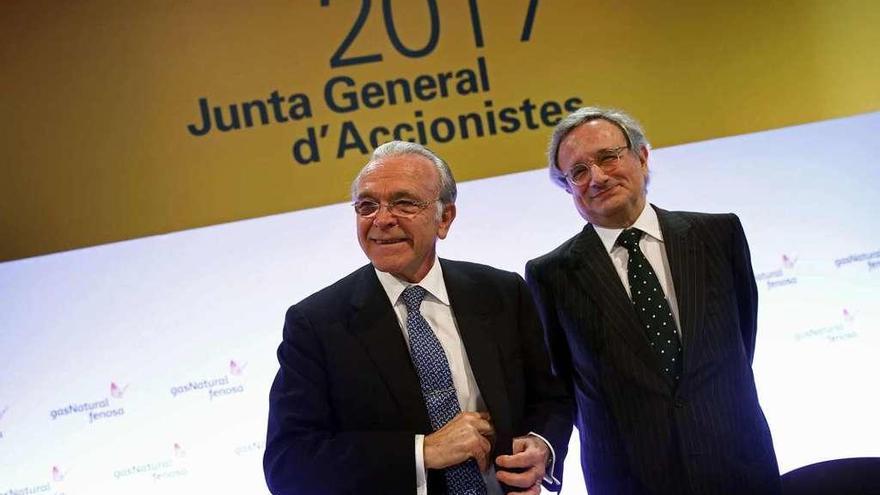 El presidente Isidro Fainé y el consejero delegado de Gas Natural, Rafael Villaseca, ayer en Madrid. // Efe