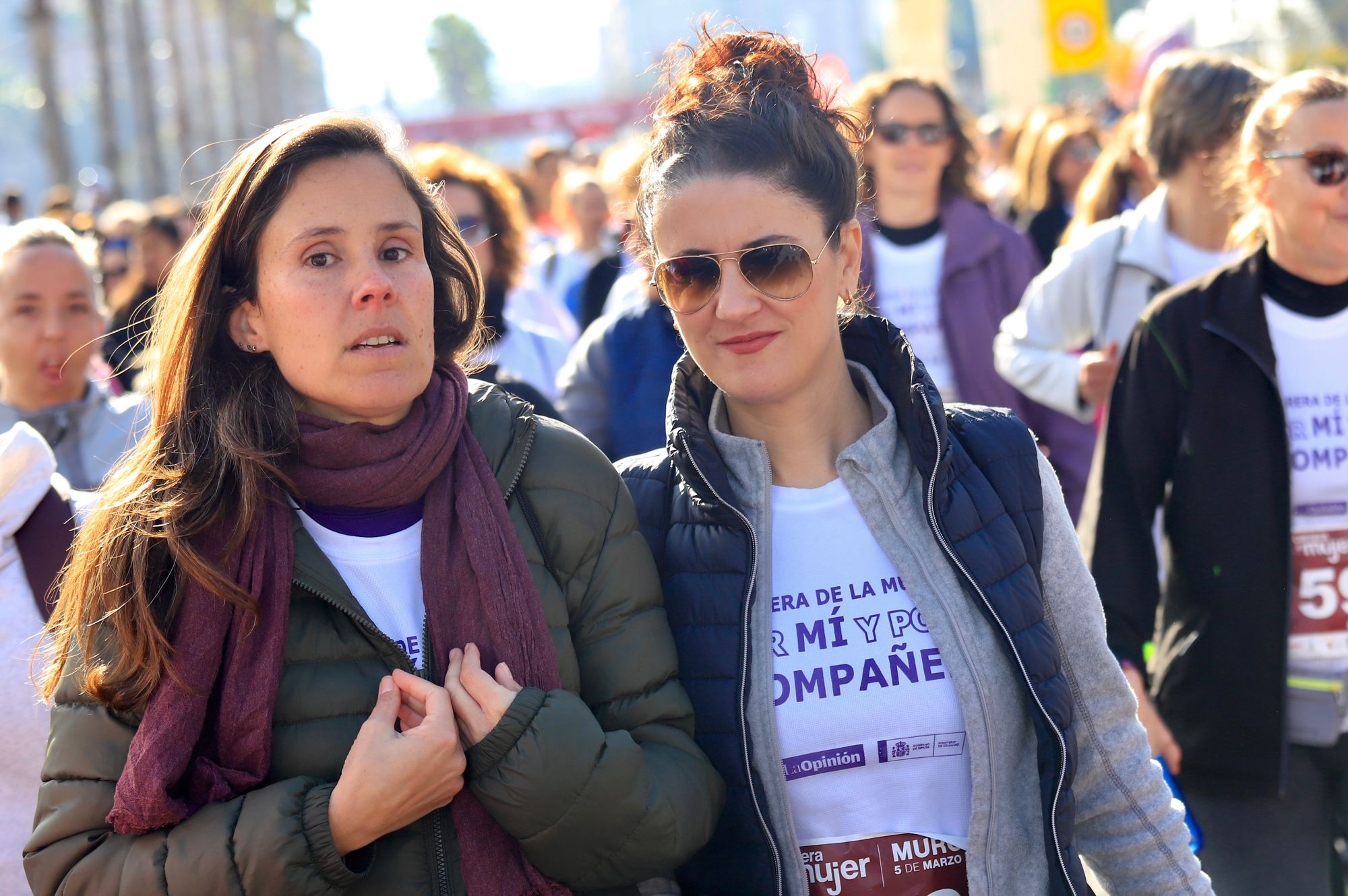 La salida y el recorrido de la Carrera de la Mujer 'inmortalizados' en imágenes