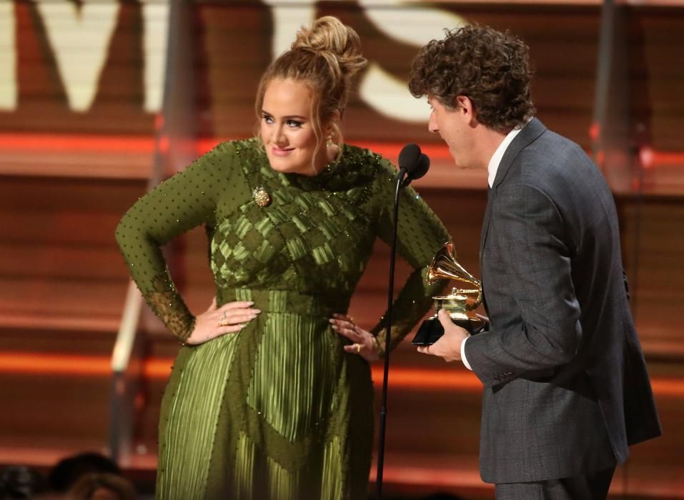 Adele and co writer Kurstin accept the Grammy ...