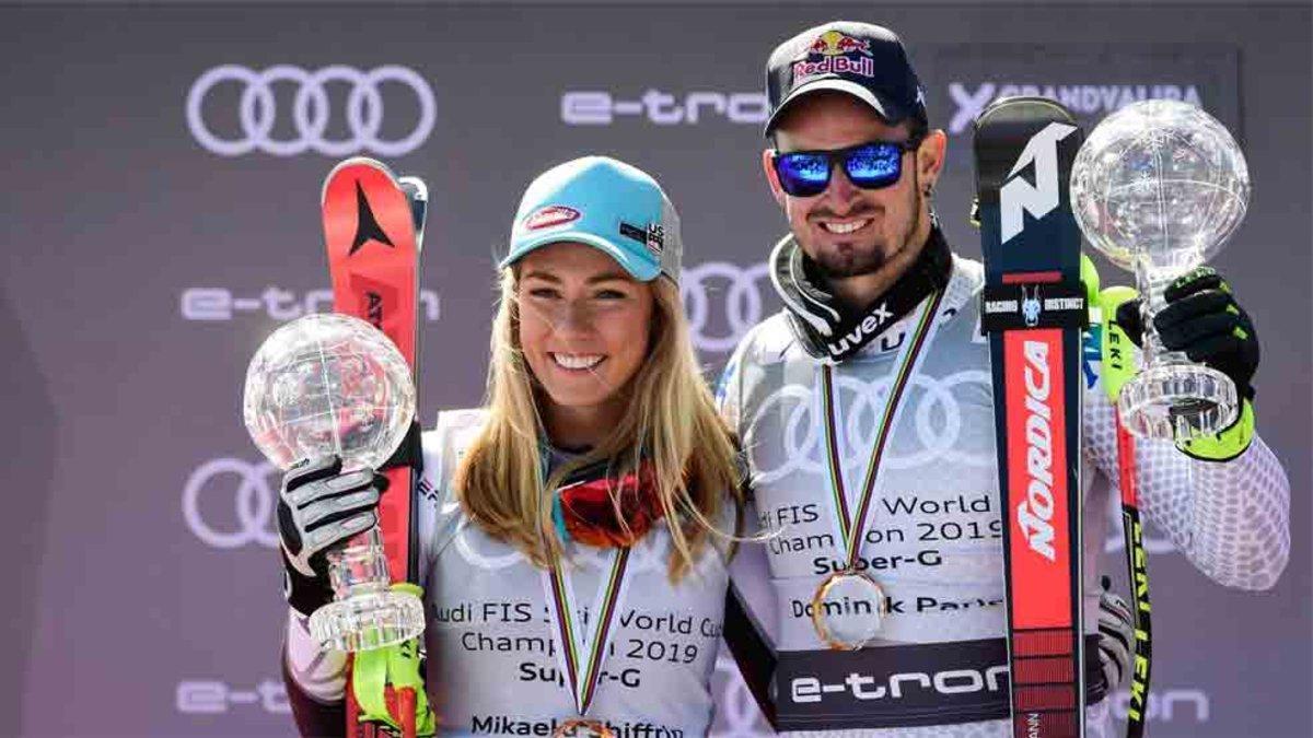 Mikaela Shiffrin y Dominik Paris, en el podium