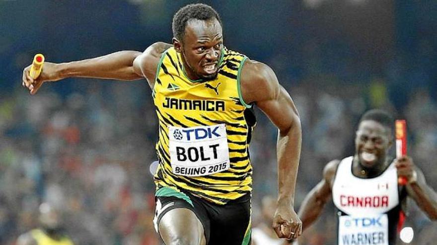 Usain Bolt &#039;vola&#039; cap a la victòria en el relleu dels 4x100, ahir a Pequín