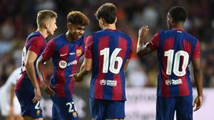 Barcelonas Spanish forward #27 Lamine Yamal (2L) celebrates with teammates at the end of the 58th Joan Gamper Trophy football match between FC Barcelona and Tottenham Hotspur FC at the Estadi Olimpic Lluis Companys in Barcelona on August 8, 2023. (Photo by Pau BARRENA / AFP)