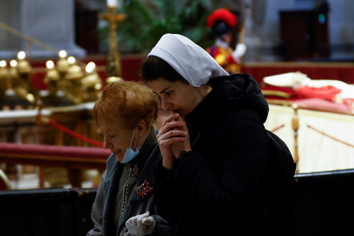 Faithful pay homage to former Pope Benedict in St. Peters Basilica at the Vatican