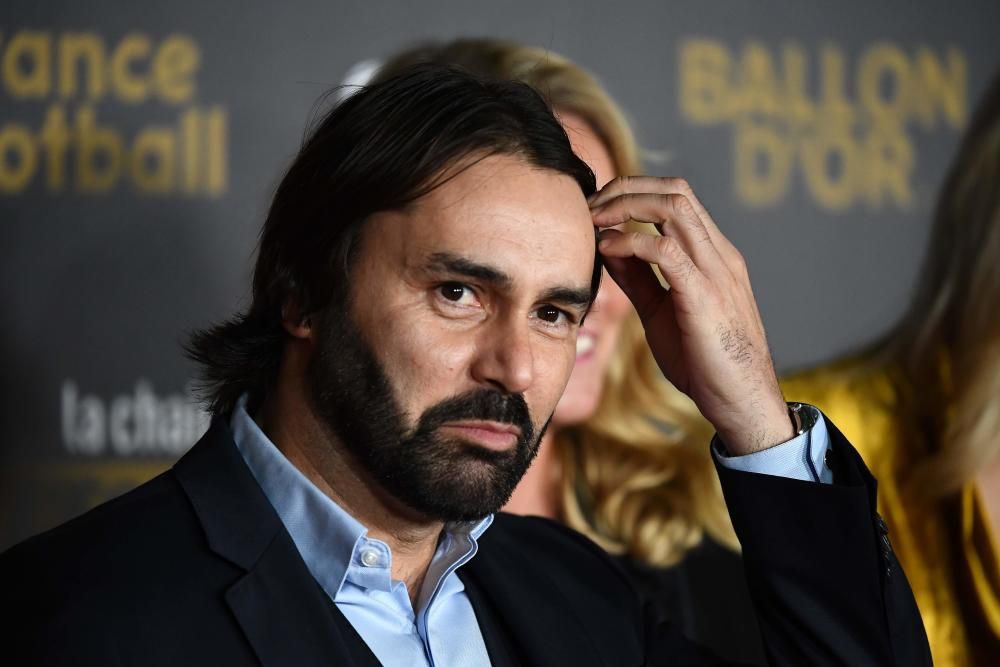 Olympique Lyonnais' French head coach Reynald Pedros poses upon arrival at the 2018 FIFA Ballon d'Or award ceremony at the Grand Palais in Paris on December 3, 2018. - The winner of the 2018 Ballon d'Or will be revealed at a glittering ceremony in Paris on December 3 evening, with Croatia's Luka Modric and a host of French World Cup winners all hoping to finally end the 10-year duopoly of Cristiano Ronaldo and Lionel Messi. (Photo by FRANCK FIFE / AFP)