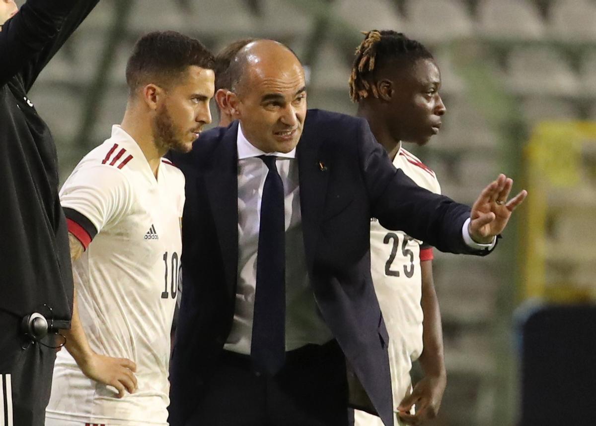 Roberto Martínez y Eden Hazard.