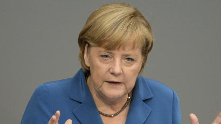 Merkel durante el debate hoy en el Bundestag.