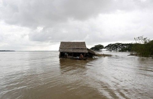 A home is seen in a flooded village outside Zalun Township, Irrawaddy Delta