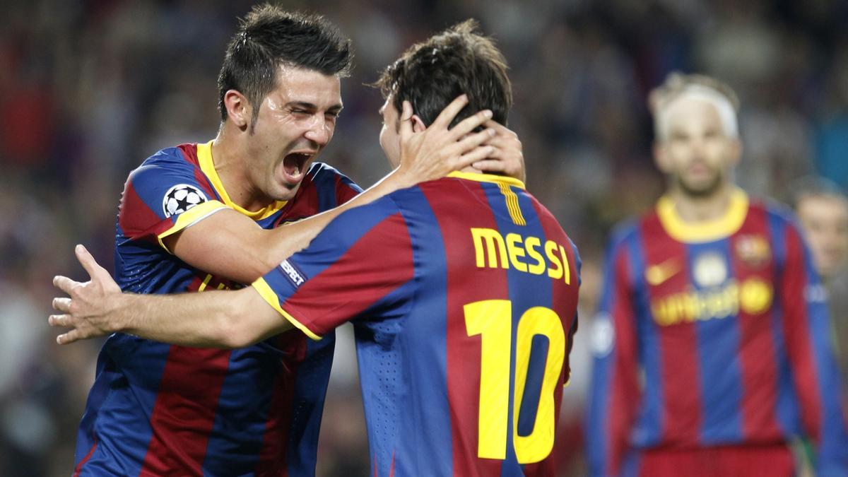 Villa y Messi, celebrando un gol de Champions con el Barça.