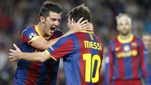 Villa y Messi, celebrando un gol de Champions con el Barça.