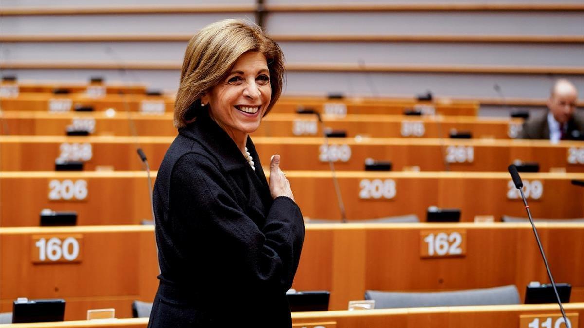 EU commissioner for Health Stella Kyriakides arrives in an empty hemicycle at the beginning of the plenary session which is reduced to a single day due to the spread of the COVID-19 illness  in Brussels  on March 10  2020  - All European Union States are hit by the novel coronavirus  (Photo by Kenzo TRIBOUILLARD   AFP)